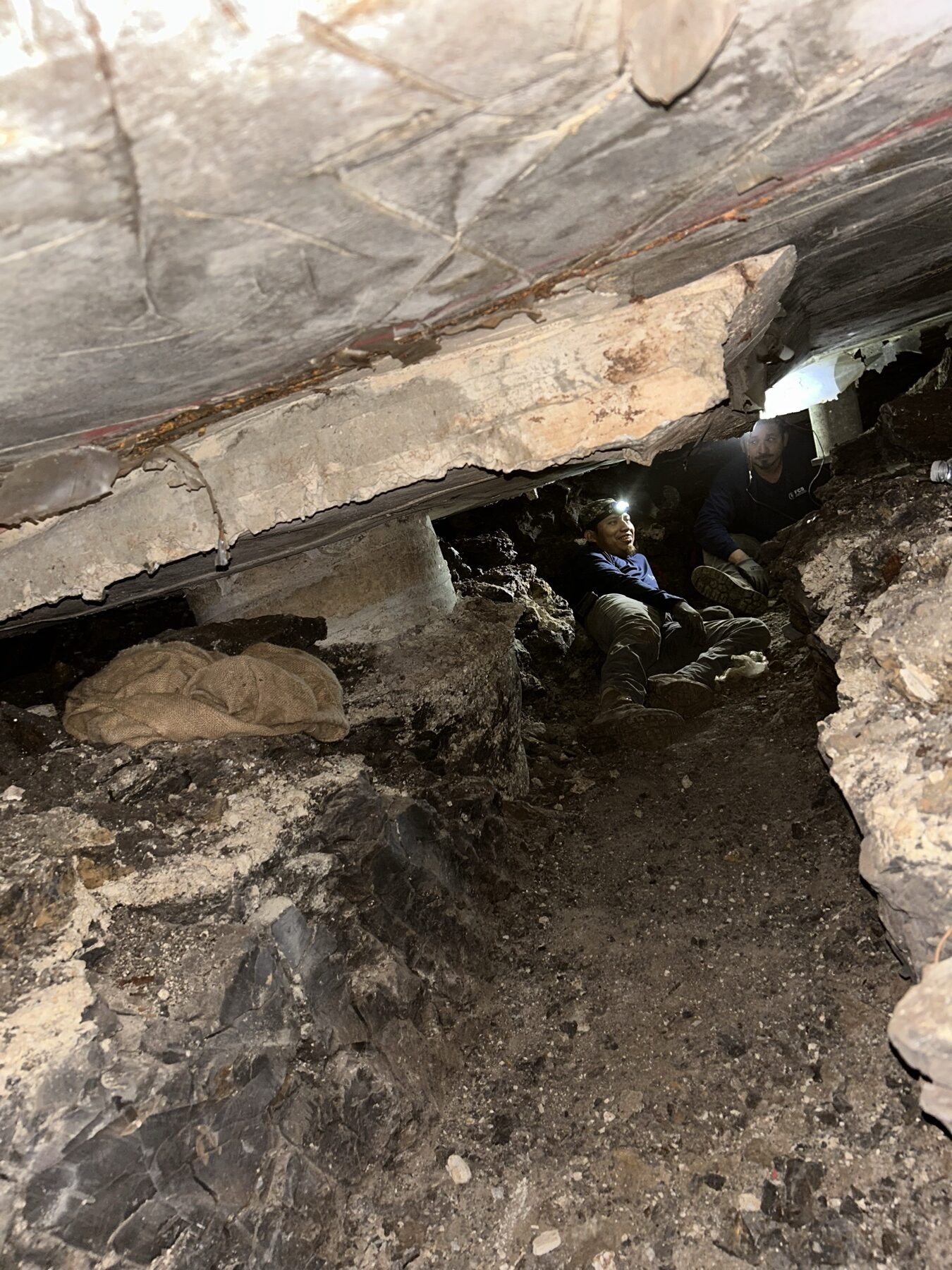 FCS crew hand-tunneling beneath the slab
