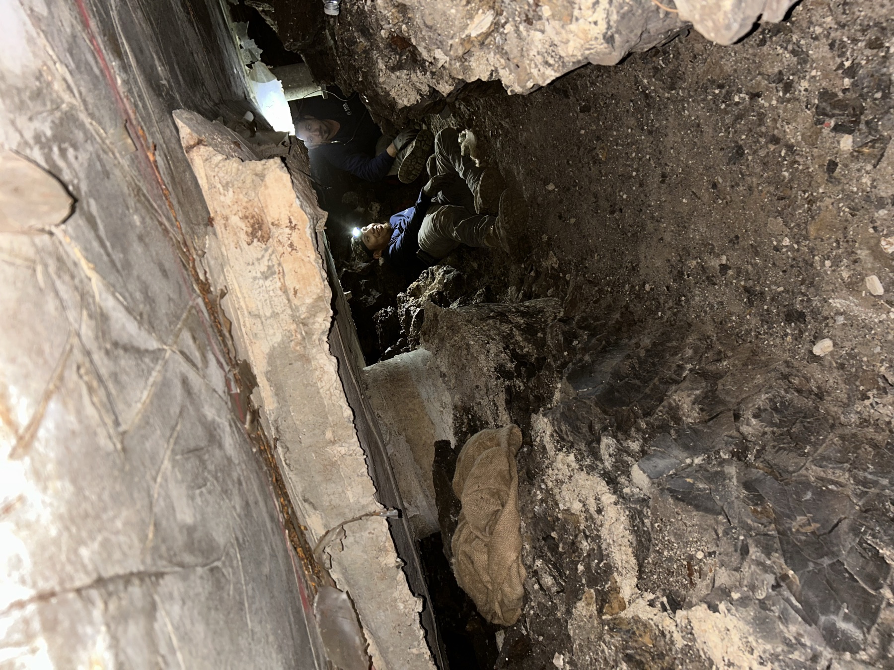 FCS crew hand-tunneling under a slab foundation