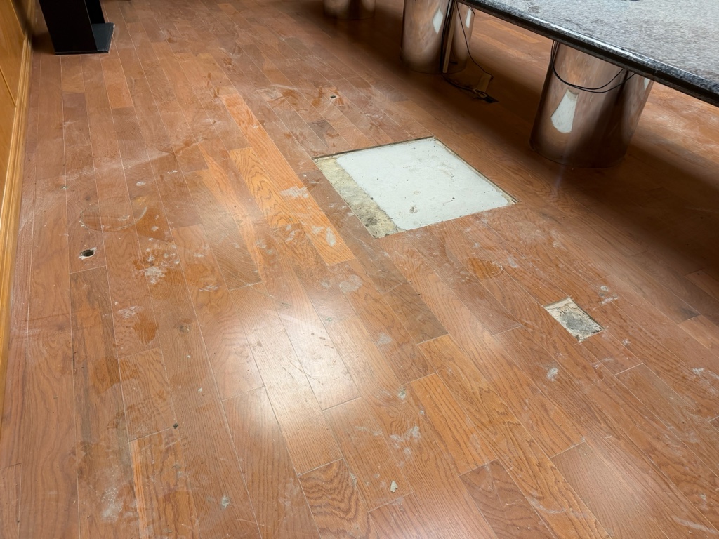 Hardwood patched over the pier locations